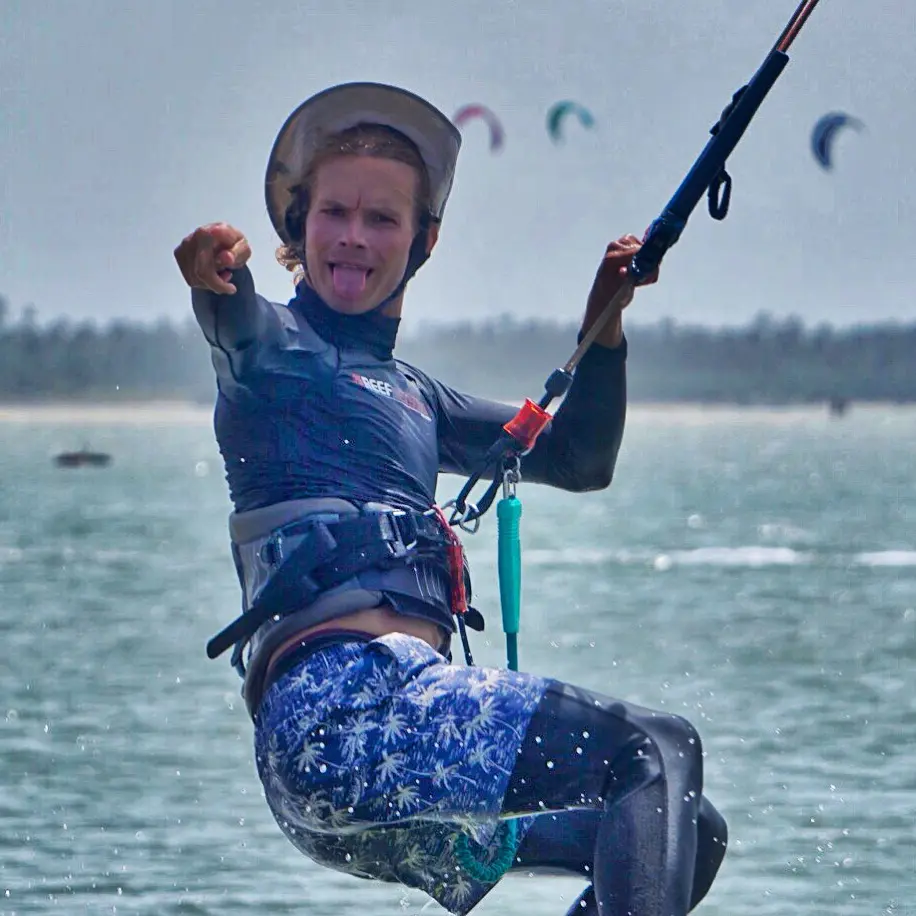 Head kite instructor coaching a beginner on the flat water of Kalpitiya Lagoon