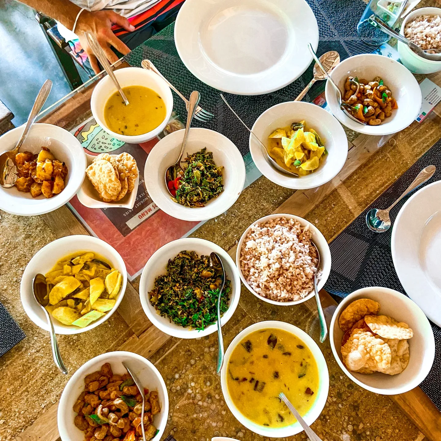 Sri Lankan rice and curry table spread at Valampuri Resort